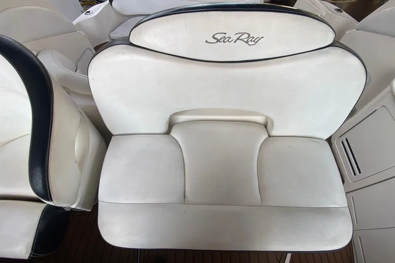 Slide: The Image of White leather seat on a 2001 Sea Ray 340 Sundancer boat. - 21