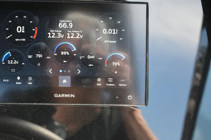 Slide: The Image of Garmin display showing Cobalt R8 2023 engine metrics, including RPM, voltage, and fuel levels. - 13
