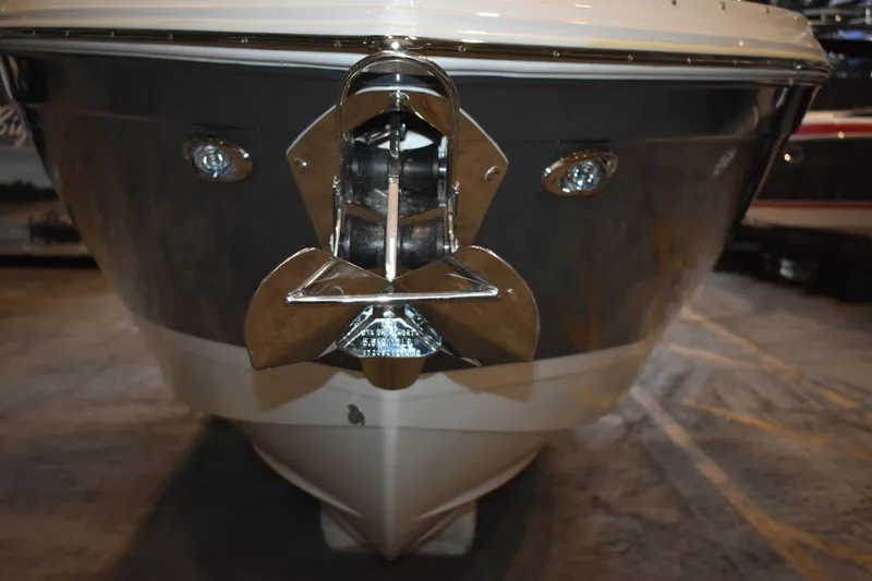 Slide: The Image of Front view of 2023 Cobalt R8 boat with polished anchor and sleek design. - 42