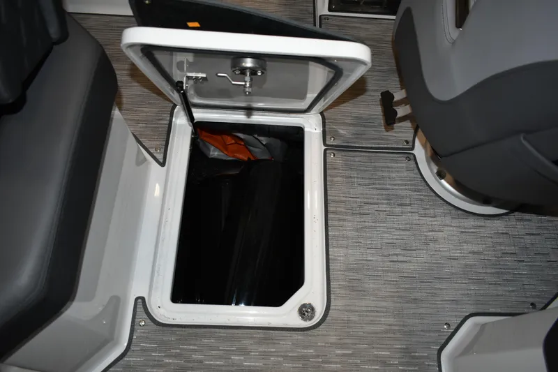 Slide: The Image of Open storage compartment in 2023 Cobalt R8 boat interior. - 31