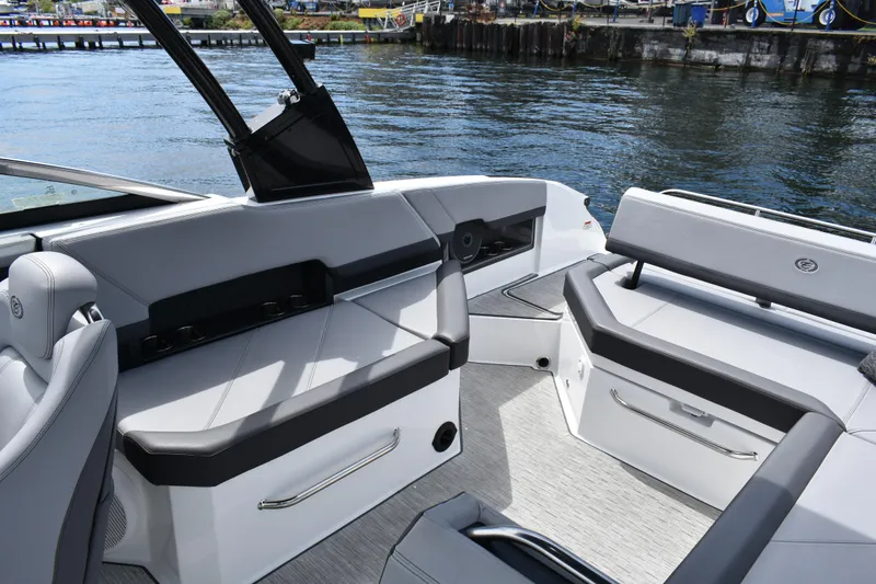 Slide: The Image of 2023 Cobalt R8 boat interior with sleek seating and waterfront view. - 20