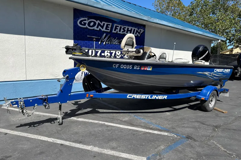 Slide: The Image of 2008 Crestliner 1750 Fish Hawk SC boat on trailer at dealership. - 2