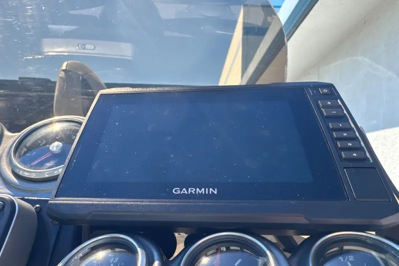 Slide: The Image of Garmin display on 2008 Crestliner 1750 Fish Hawk SC boat dashboard. - 16