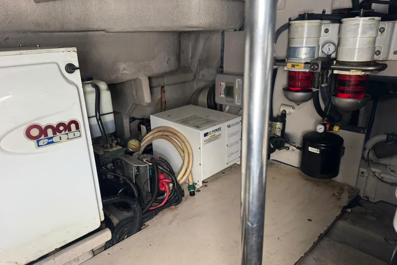 Slide: The Image of Engine room of 2006 Sea Ray 52 Sundancer with Onan generator and C-Power equipment. - 20