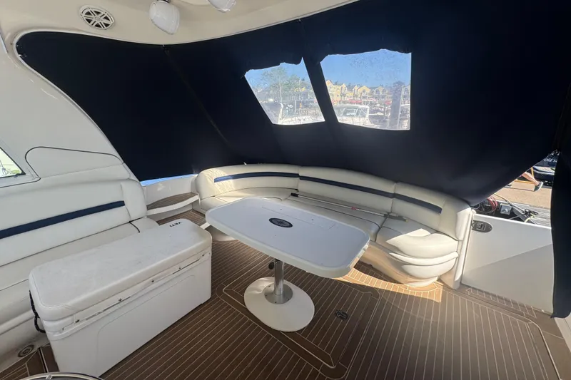 Slide: The Image of Luxurious interior of 2006 Sea Ray 52 Sundancer yacht with elegant seating and table. - 4