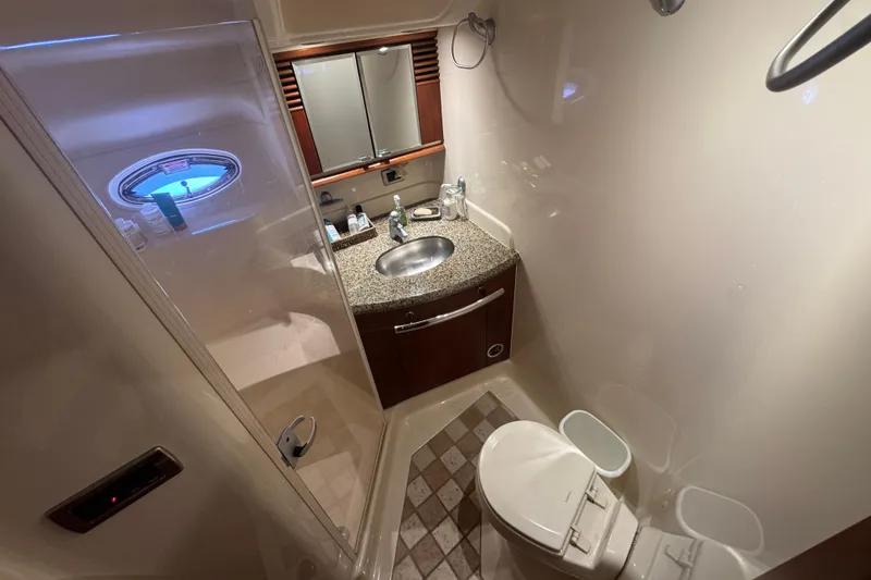 Slide: The Image of Luxurious bathroom in 2006 Sea Ray 52 Sundancer yacht with modern amenities. - 14