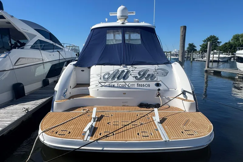 Slide: The Image of 2006 Sea Ray 52 Sundancer yacht docked at New York City Harbor. - 2