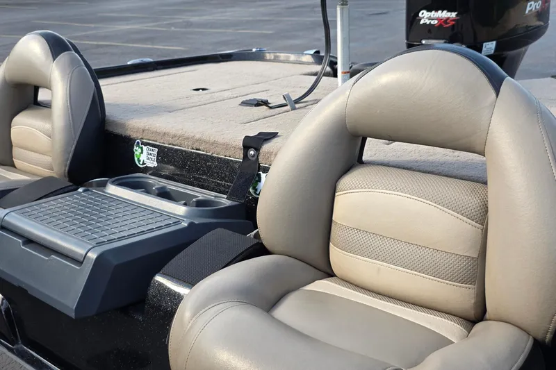 Slide: The Image of 2012 Nitro Z-7 boat interior with cushioned seats and OptiMax Pro XS engine. - 20