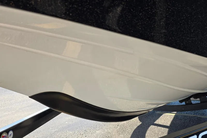 Slide: The Image of Close-up of a 2012 Nitro Z-7 boat hull on a trailer. - 25