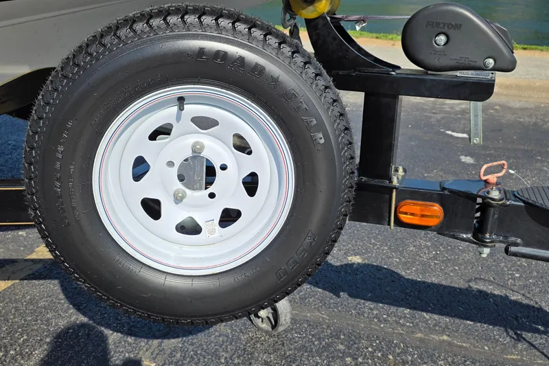 Slide: The Image of Trailer tire on a 2012 Nitro Z-7 boat trailer, featuring Loadstar branding. - 26