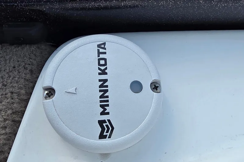 Slide: The Image of Minn Kota trolling motor component on 2012 Nitro Z-7 boat deck. - 33