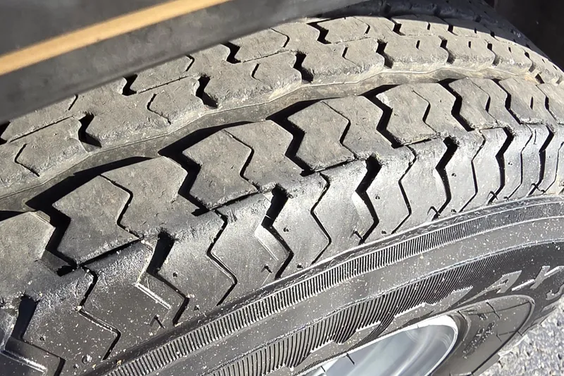 Slide: The Image of Close-up of a 2012 Nitro Z-7 tire with visible tread pattern. - 28