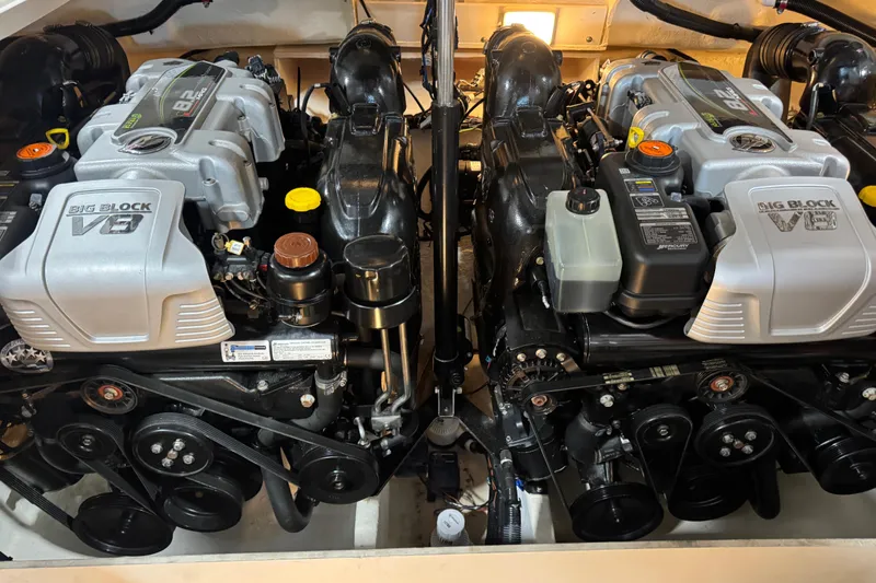 Slide: The Image of Twin Big Block V8 engines in a 2016 Sea Ray SLX 350 boat. - 15