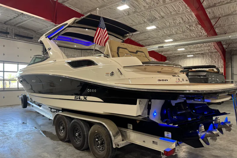 Slide: The Image of 2016 Sea Ray SLX 350 boat on trailer in indoor storage facility. - 4