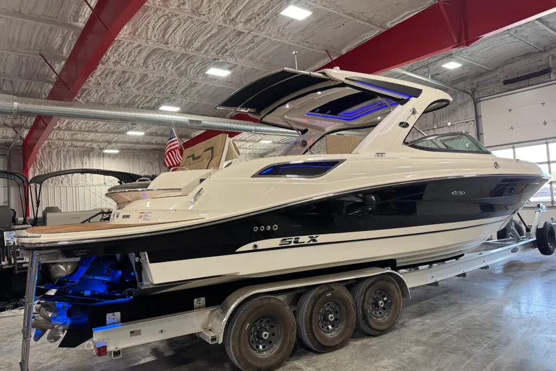 Slide: The Image of 2016 Sea Ray SLX 350 boat on trailer in indoor storage facility. - 3