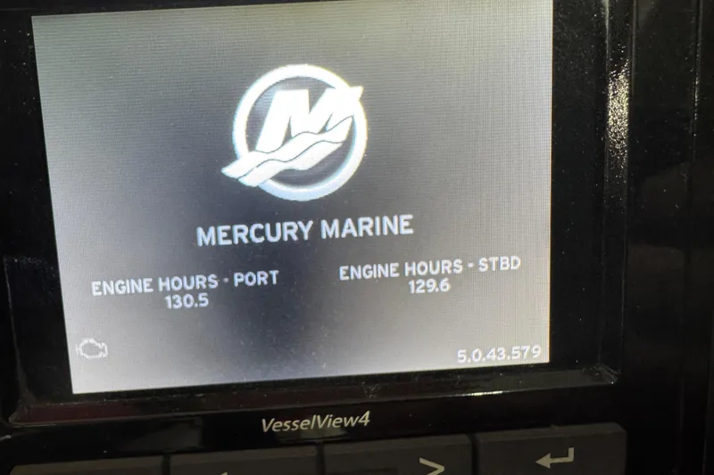 Slide: The Image of Mercury Marine engine display showing port and starboard hours for 2016 Sea Ray SLX 350. - 14