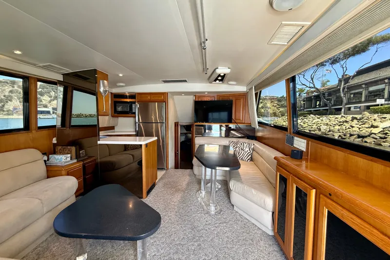 Slide: The Image of Luxurious interior of a 1994 Viking 47 Convertible yacht with modern amenities and scenic views. - 10