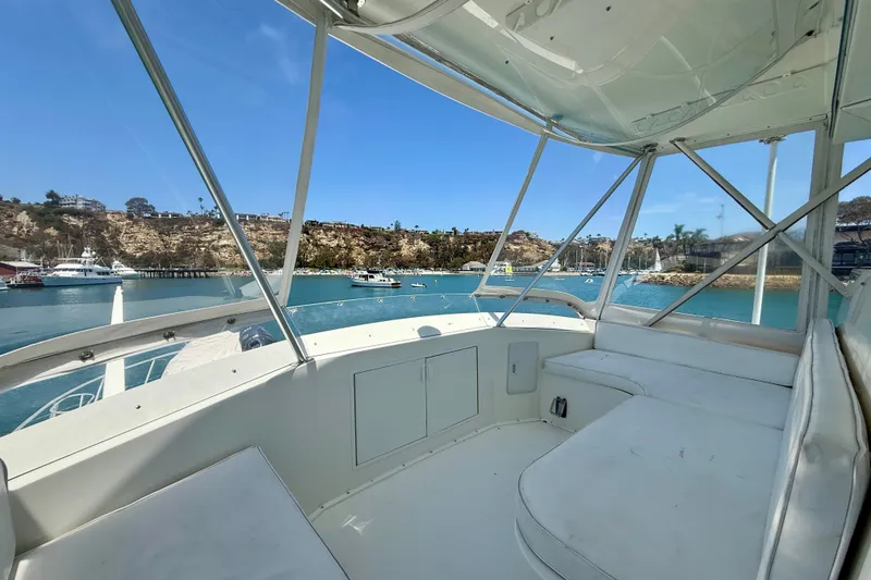 Slide: The Image of Interior view of 1994 Viking 47 Convertible yacht overlooking marina. - 61
