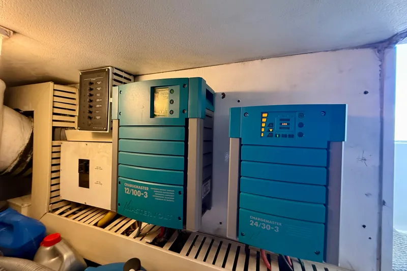 Slide: The Image of Electrical system in a 1994 Viking 47 Convertible boat, featuring Mastervolt chargers. - 74