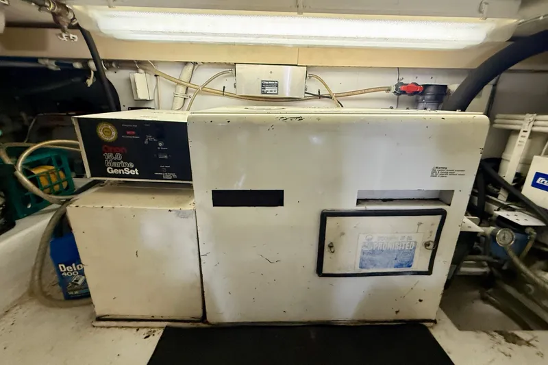 Slide: The Image of Engine room of 1994 Viking 47 Convertible with 15.0 Marine GenSet. - 78