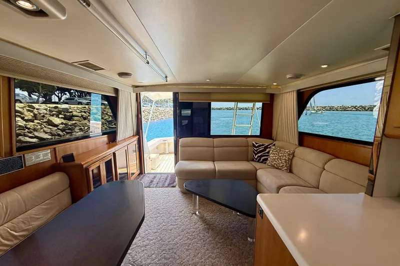 Slide: The Image of Luxurious interior of a 1994 Viking 47 Convertible yacht with ocean view. - 11