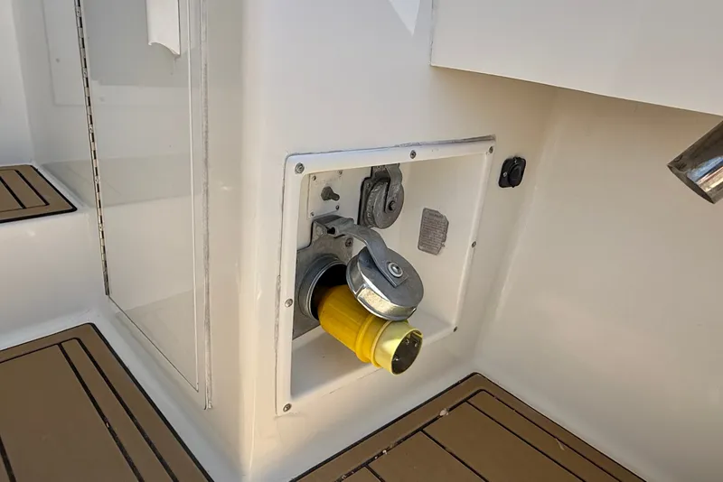 Slide: The Image of Power connection on a 1994 Viking 47 Convertible yacht deck. - 49