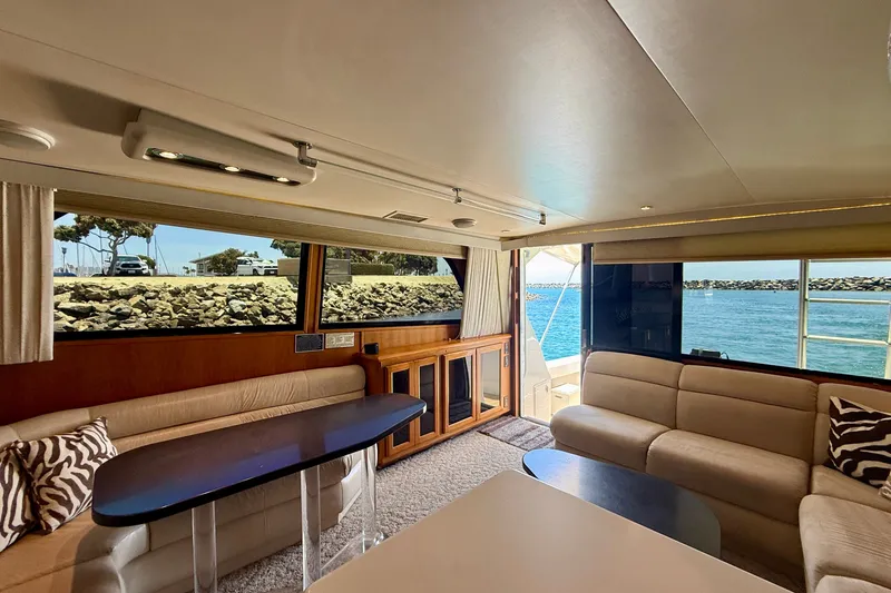 Slide: The Image of Luxurious interior of a 1994 Viking 47 Convertible yacht with ocean view. - 14