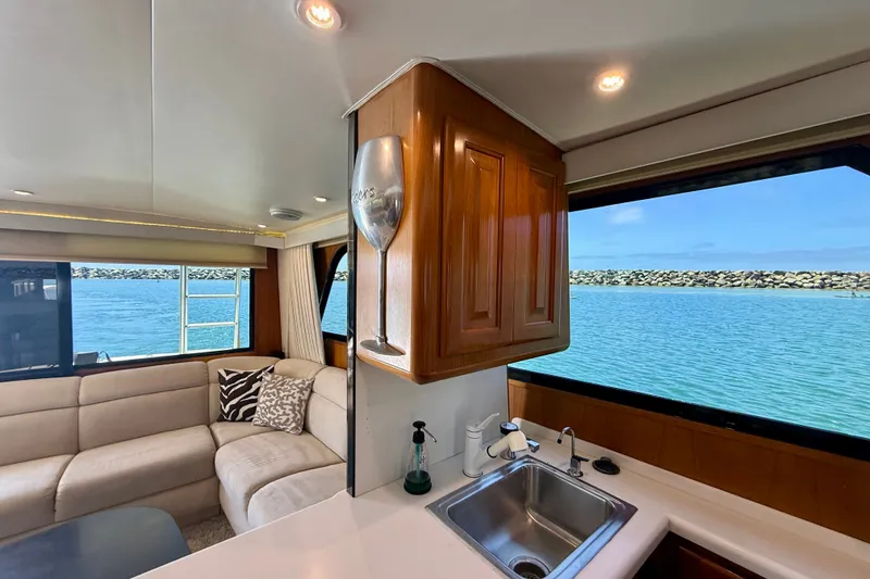 Slide: The Image of Luxurious interior of 1994 Viking 47 Convertible yacht with ocean view. - 15
