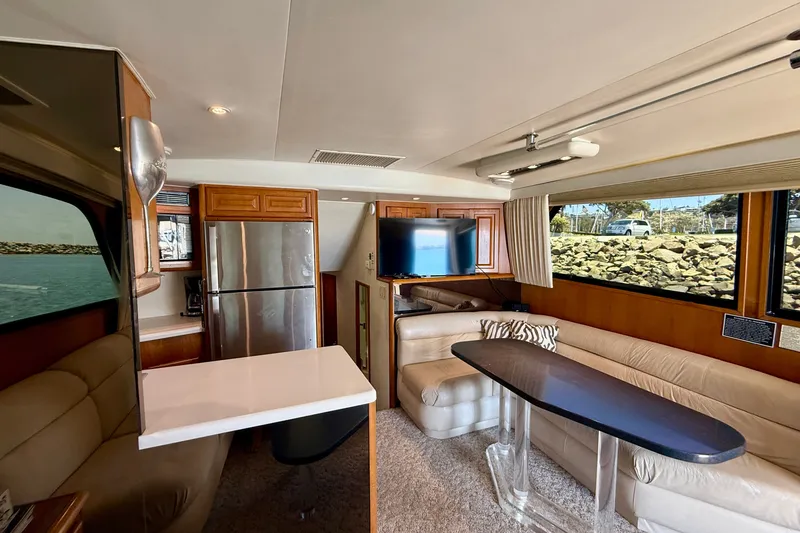 Slide: The Image of Luxurious interior of a 1994 Viking 47 Convertible yacht with modern amenities. - 13