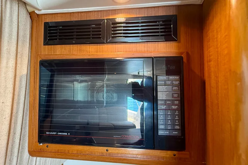 Slide: The Image of Sharp Carousel II microwave in 1994 Viking 47 Convertible yacht kitchen. - 35