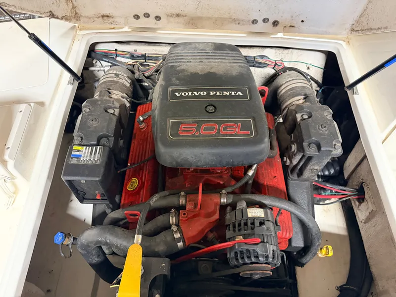 Slide: The Image of Engine compartment of a 2003 Glastron DX215 with a 5.0L Volvo/Penta engine. - 44