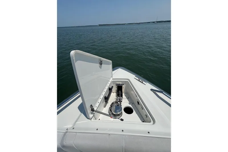 Slide: The Image of Open hatch on 2019 Formula 430 Super Sport Crossover boat, revealing anchor storage. - 59