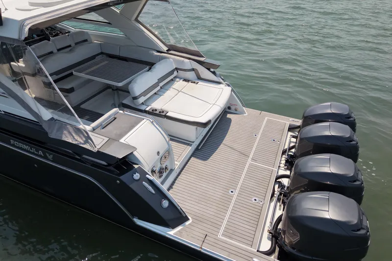 Slide: The Image of 2019 Formula 430 Super Sport Crossover boat with spacious deck and four powerful engines. - 15
