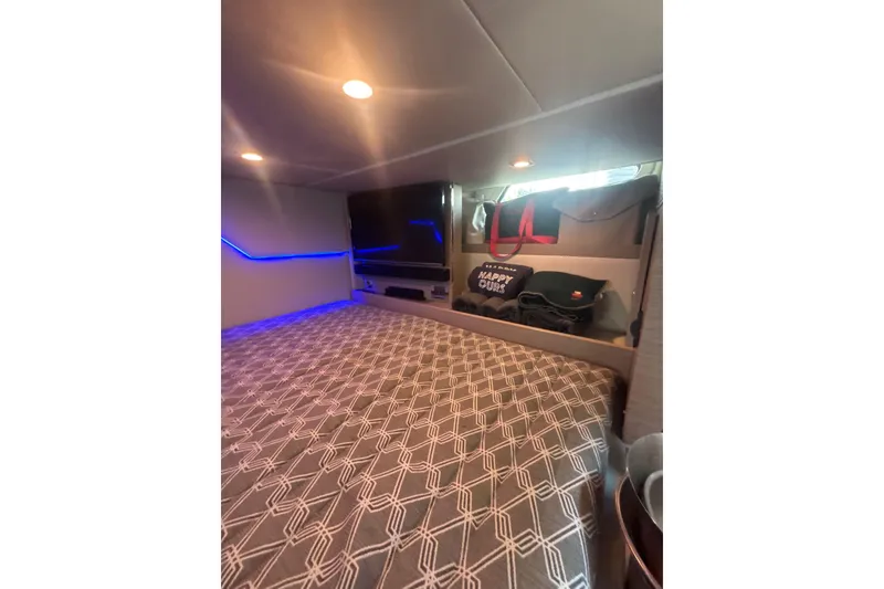 Slide: The Image of Interior cabin of 2019 Formula 430 Super Sport Crossover with modern lighting and storage. - 70