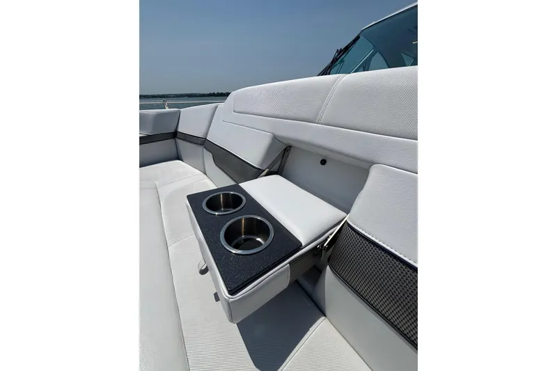 Slide: The Image of Interior of 2019 Formula 430 Super Sport Crossover boat with cup holders and seating. - 52