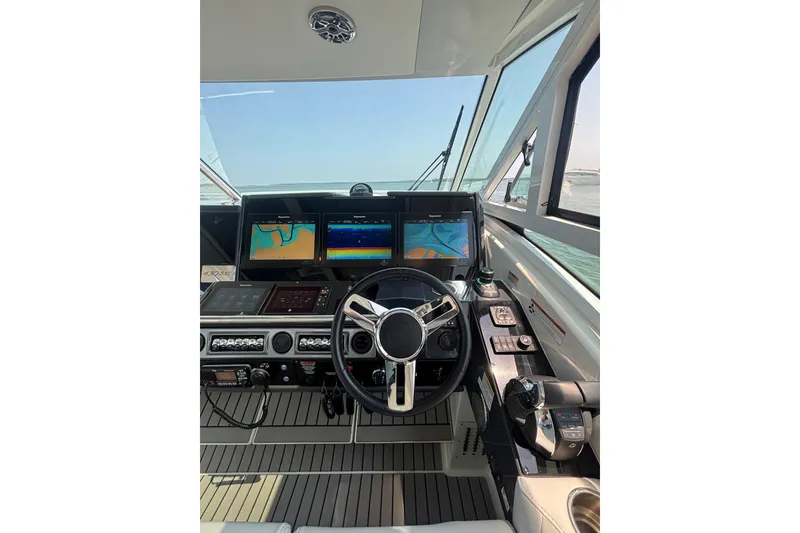 Slide: The Image of Cockpit of 2019 Formula 430 Super Sport Crossover with advanced navigation displays. - 42