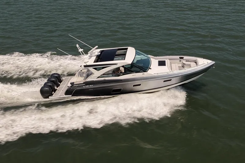 Slide: The Image of 2019 Formula 430 Super Sport Crossover cruising on open water, showcasing sleek design and power. - 81