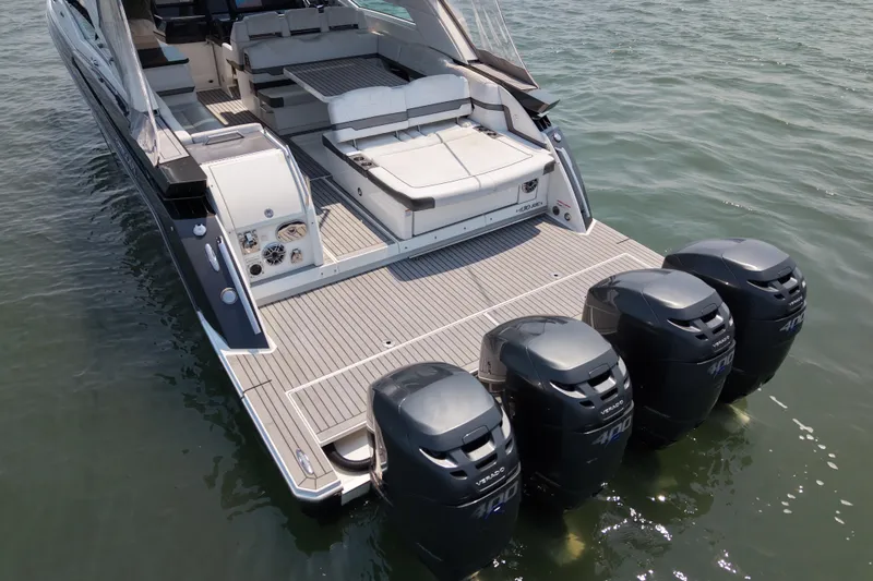 Slide: The Image of 2019 Formula 430 Super Sport Crossover with four powerful outboard engines on water. - 18
