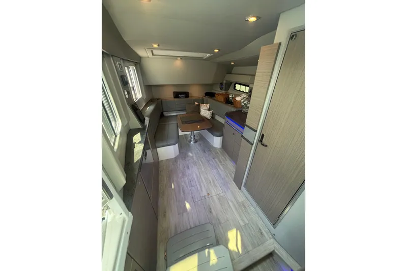 Slide: The Image of Interior of 2019 Formula 430 Super Sport Crossover, featuring modern seating and sleek design. - 60