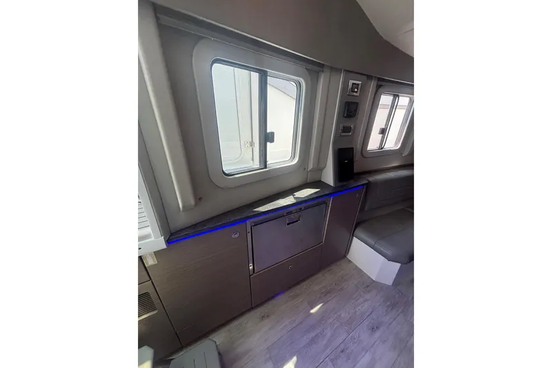 Slide: The Image of Interior of 2019 Formula 430 Super Sport Crossover with modern seating and cabinetry. - 76