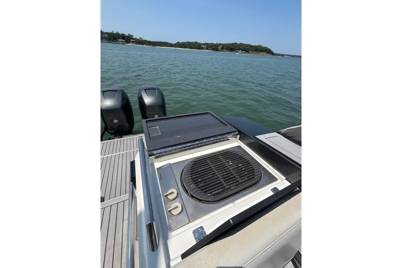 Slide: The Image of Outdoor grill on 2019 Formula 430 Super Sport Crossover yacht, with scenic water view. - 58
