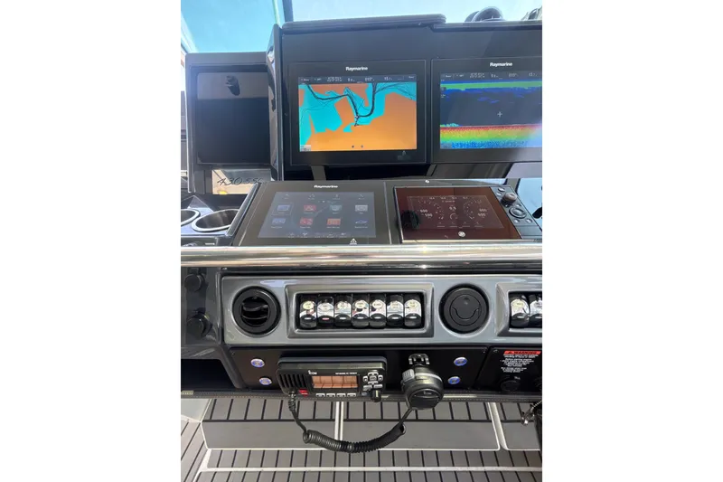 Slide: The Image of Control panel of 2019 Formula 430 Super Sport Crossover with navigation screens and controls. - 53