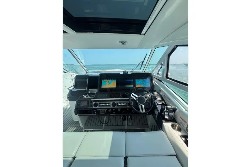 Slide: The Image of 2019 Formula 430 Super Sport Crossover helm with advanced navigation displays. - 41