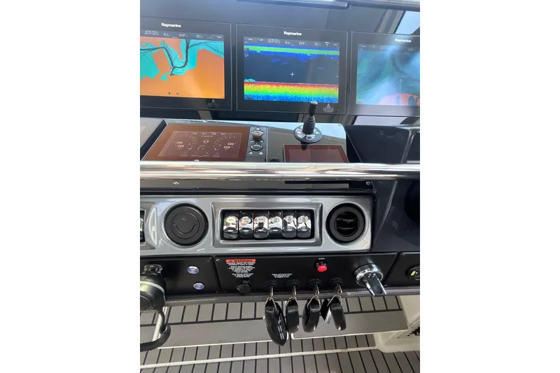 Slide: The Image of Control panel of 2019 Formula 430 Super Sport Crossover with Raymarine displays. - 54