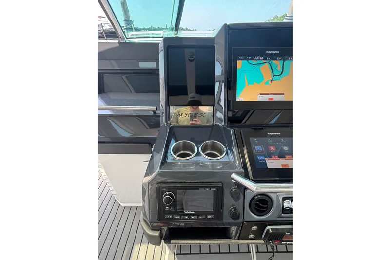 Slide: The Image of Dashboard of 2019 Formula 430 Super Sport Crossover with navigation screens and controls. - 56