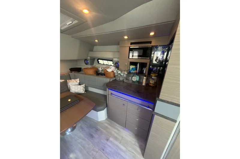 Slide: The Image of Luxurious interior of 2019 Formula 430 Super Sport Crossover with modern amenities and seating. - 62