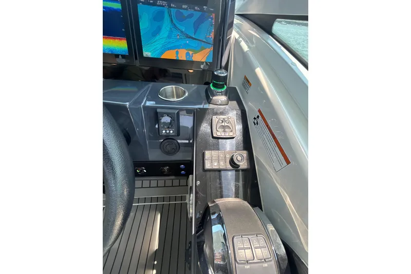 Slide: The Image of Control panel of 2019 Formula 430 Super Sport Crossover with navigation screens and controls. - 55