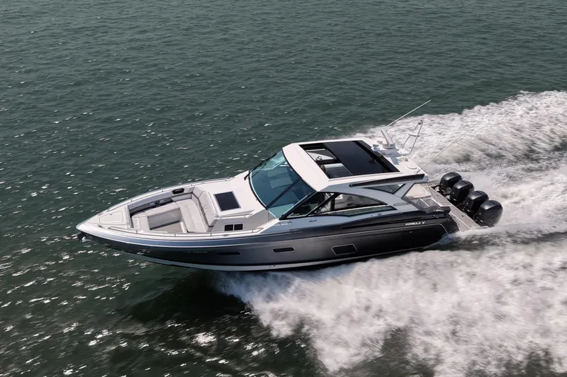 Slide: The Image of 2019 Formula 430 Super Sport Crossover cruising on open water, showcasing sleek design and powerful engines. - 6