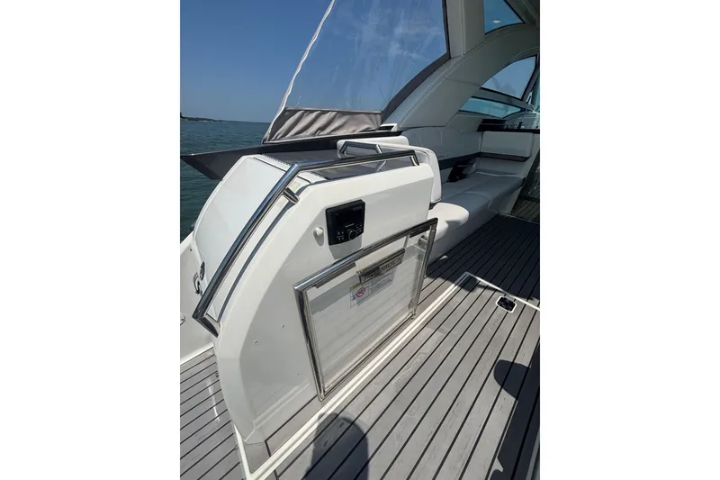 Slide: The Image of 2019 Formula 430 Super Sport Crossover yacht interior with sleek seating and modern design. - 31