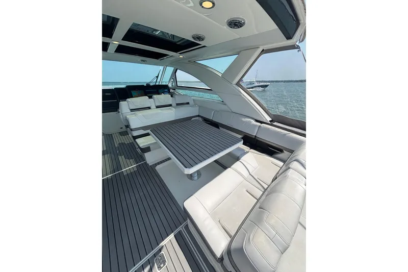 Slide: The Image of Luxurious interior of 2019 Formula 430 Super Sport Crossover yacht with sleek seating and table. - 35